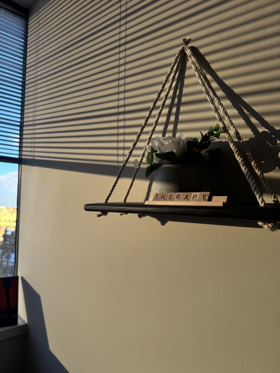 Therapy Office wall - Conscientia Counselling Shelf hanging from the wall